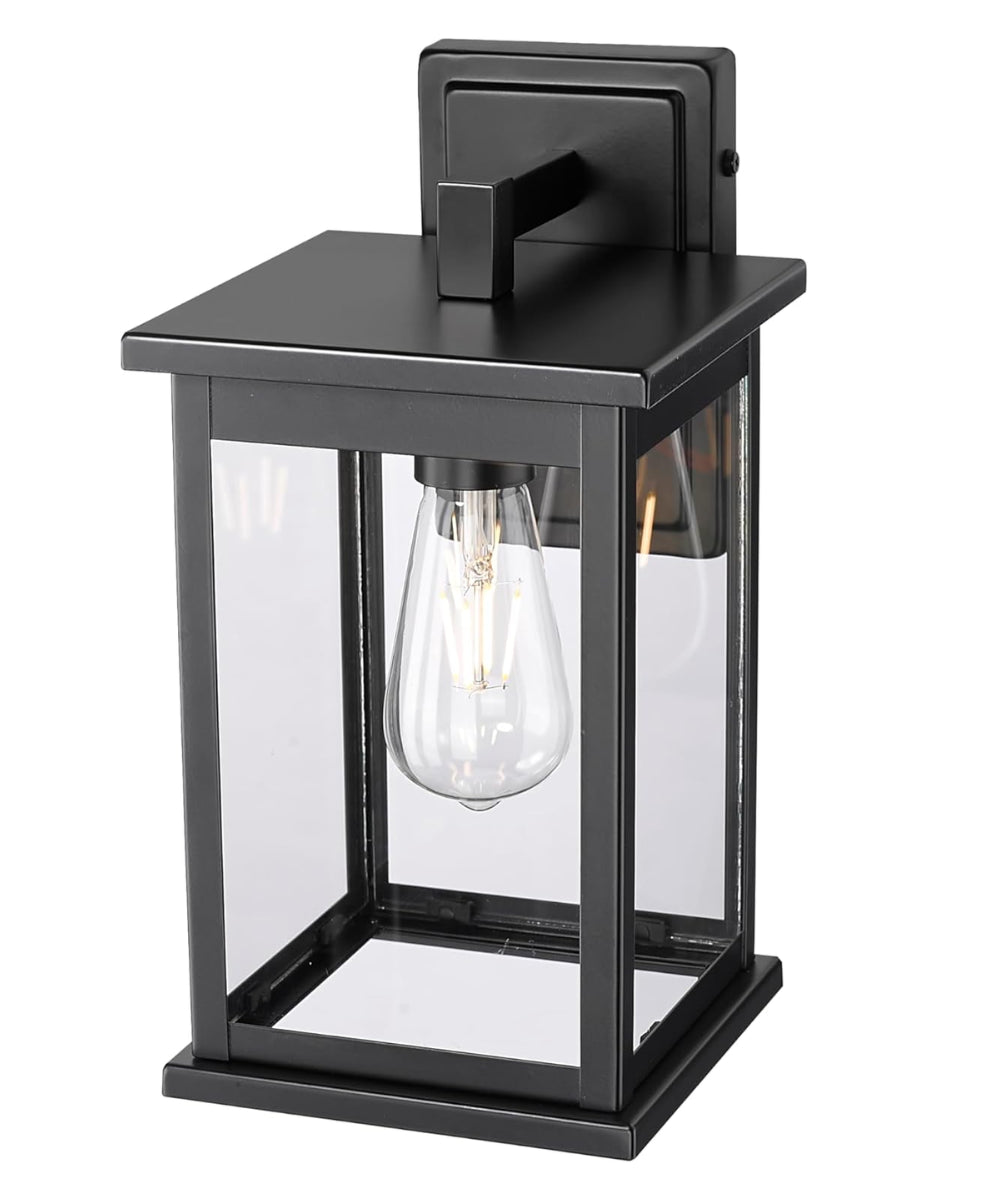 11"H Bowton II Outdoor Wall Light - Dusk to Dawn Matte Black Finish with Glass Shade by Millennium Lighting