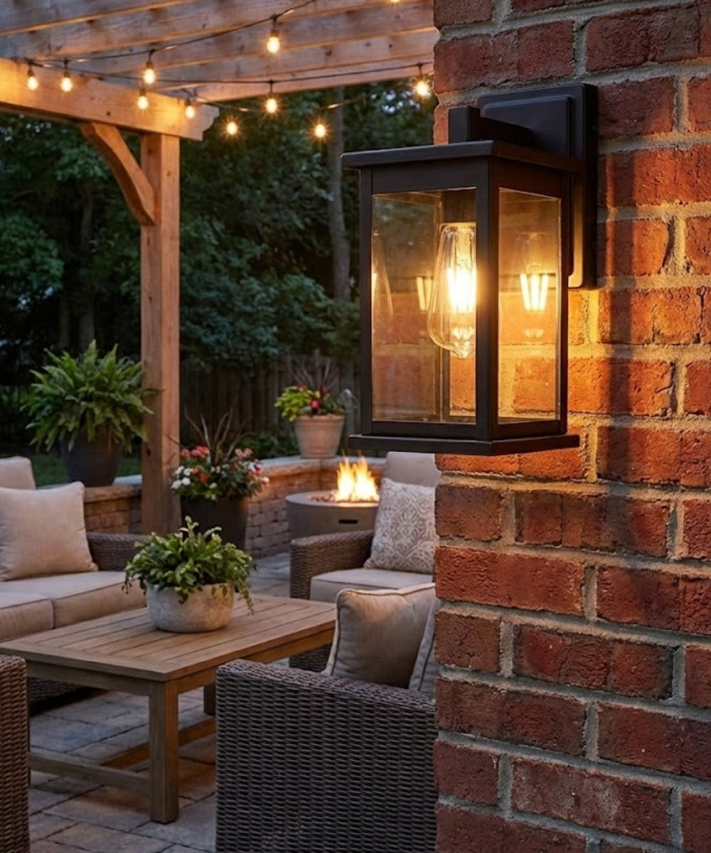 11"H Bowton II Outdoor Wall Light - Dusk to Dawn Matte Black Finish with Glass Shade by Millennium Lighting
