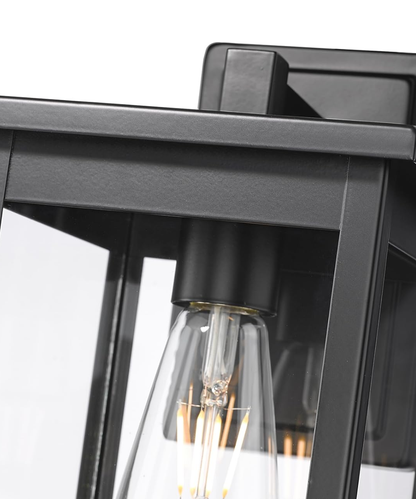 11"H Bowton II Outdoor Wall Light - Dusk to Dawn Matte Black Finish with Glass Shade by Millennium Lighting