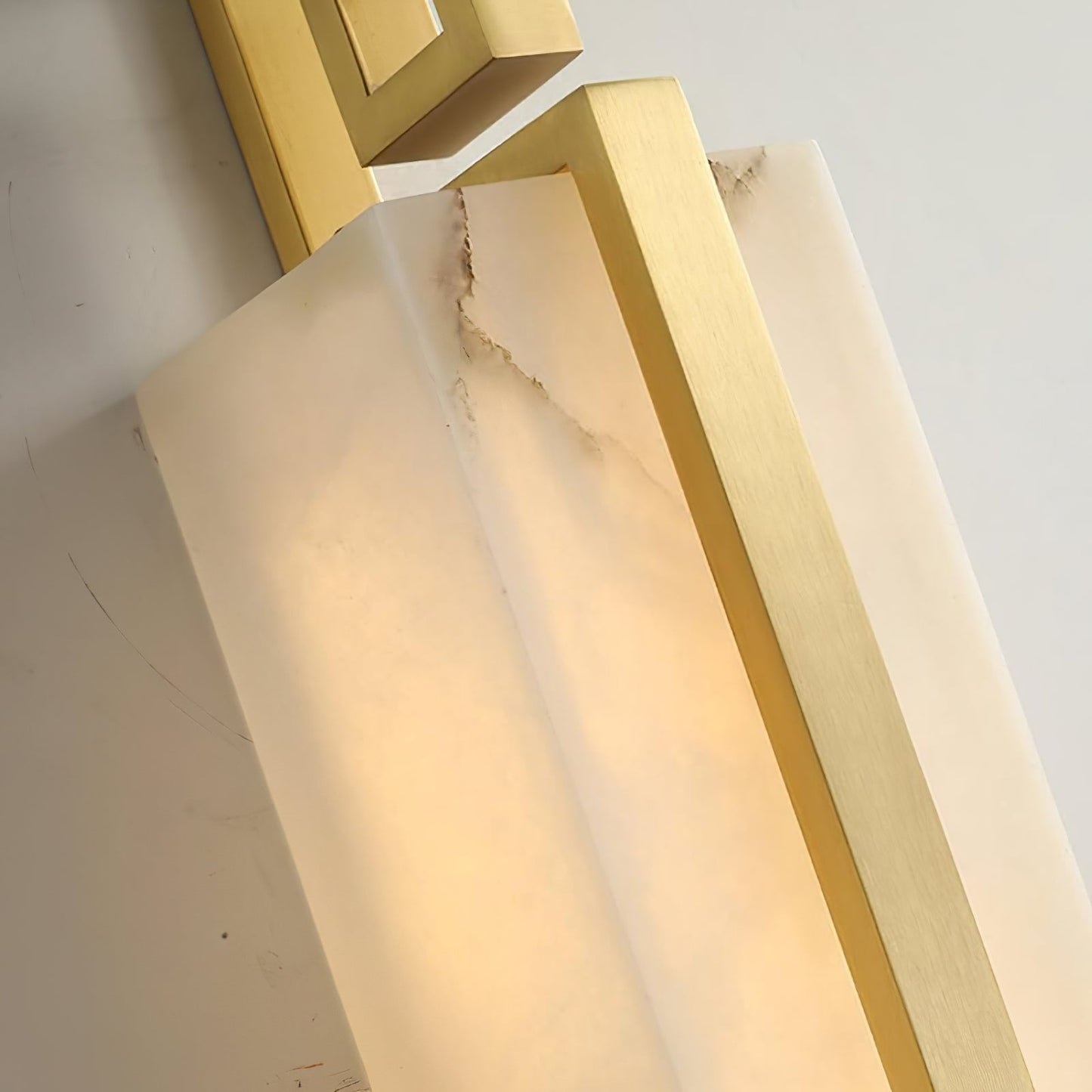 Sleek Alabaster Brass Wall Light